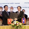 Việt Nam-Lào tăng cường hợp tác phát triển thương mại biên giới 