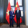 Thủ tướng Phạm Minh Chính gặp Thủ tướng Trung Quốc Lý Khắc Cường