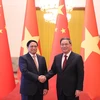 Hình ảnh lễ đón Thủ tướng Phạm Minh Chính thăm chính thức Trung Quốc