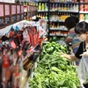 ADB: Người dân hạn chế mua sắm kìm hãm đà phục hồi của Trung Quốc