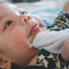 Bình Phước: Làm rõ vụ bé trai 2 tuổi tử vong nghi do sặc sữa