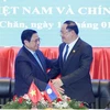 Việt Nam-Lào gìn giữ và làm sâu sắc hơn quan hệ đặc biệt giữa hai nước