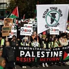 Tuần hành ủng hộ người Palestine tại London, Anh ngày 11/11/2023. (Ảnh: AFP)