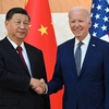 Tổng thống Mỹ Joe Biden (phải) trong cuộc gặp Chủ tịch Trung Quốc Tập Cận Bình bên lề Hội nghị Thượng đỉnh Nhóm các Nền Kinh tế Phát triển và Mới nổi hàng đầu thế giới (G20) ở Bali, Indonesia ngày 14/11/2022. (Ảnh: AFP/TTXVN)