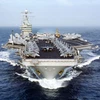 Tàu sân bay USS Dwight D. Eisenhower của Mỹ di chuyển trên Đại Tây Dương. (Ảnh: AFP/TTXVN)