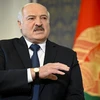 Tổng thống Belarus Alexander Lukashenko phát biểu với báo giới tại Minsk. (Ảnh: AFP/TTXVN)