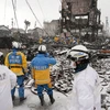 Lực lượng cứu hộ tìm kiếm người mất tích sau động đất tại tỉnh Ishikawa, miền Trung Nhật Bản ngày 7/1/2024. (Ảnh: Kyodo/TTXVN)