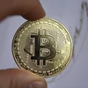 Đồng tiền kỹ thuật số bitcoin. (Ảnh: AFP/TTXVN)