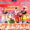 Màn múa dân tộc của các thành viên Hội hữu nghị Malaysia-Việt Nam. (Ảnh: Hằng Linh/TTXVN)