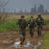Binh sĩ Israel tuần tra gần Kfar Blum, giáp giới với Liban ngày 25/1/2024. (Ảnh: AFP/TTXVN)