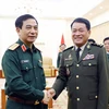 Bộ trưởng Bộ Quốc phòng Phan Văn Giang tiếp Tổng Tư lệnh Quân đội Hoàng gia Campuchia Vong Pisen trong chuyến thăm Việt Nam ngày 17/10/2023. (Ảnh: An Đăng/TTXVN)