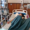 Bệnh nhân M. được cấp cứu tại bệnh viện Đa khoa Trung tâm An Giang. (Ảnh: TTXVN phát)