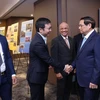 Thủ tướng Phạm Minh Chính gặp Hội doanh nghiệp Việt Nam tại Australia. (Ảnh: Dương Giang/TTXVN)