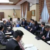 Quang cảnh buổi làm việc giữa Bộ trưởng Tài chính Hồ Đức Phớc và Bộ trưởng Tài chính Nhật Bản Shunichi Suzuki. (Ảnh: Phạm Tuân/TTXVN)