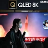 Bản tin về vụ phóng tên lửa của Triều Tiên được phát sóng tại Seoul, Hàn Quốc, ngày 18/3/2024. (Ảnh: AFP/TTXVN)