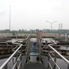 Bể chứa và các thiết bị Dự án Hệ thống xử lý nước thải Khu công nghiệp Quán Ngang đã cơ bản hoàn thành nhưng chưa thể vận hành. (Ảnh: Nguyên Lý/TTXVN)