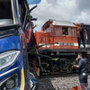 Hiện trường vụ tai nạn giữa tàu hỏa và xe buýt ở Nam Sumatra, Indonesia. (Nguồn: Antara)