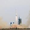 Tên lửa đẩy Trường Chinh-2F mang theo tàu vũ trụ Thần Châu-16 rời bệ phóng tại Trung tâm phóng vệ tinh Tửu Tuyền ở Tây Bắc Trung Quốc ngày 30/5/2023. (Ảnh: THX/TTXVN)