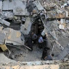 Tòa nhà bị phá hủy sau vụ oanh kích của Israel xuống thành phố Rafah, Dải Gaza, ngày 7/5/2024. (Ảnh: THX/TTXVN)
