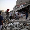 Cảnh đổ nát sau cuộc không kích của Israel xuống Dải Gaza ngày 11/5/2024. (Ảnh: THX/TTXVN)