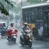 Một trận mưa dông lớn tại Hà Nội. (Ảnh: Lê Minh Sơn/Vietnam+)