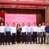 Lãnh đạo thành phố Hà Nội với đại biểu các cơ quan báo chí Trung ương và Hà Nội tại buổi gặp mặt. (Ảnh: Văn Điệp/TTXVN)