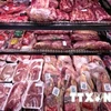Ảnh minh họa: Nhiều nguy cơ đến từ việc nhập khẩu thịt bò nước ngoài. (Nguồn TTXVN)