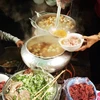 Quán bún bò Huế ở ngõ Hùng Vương chỉ mở bán từ 7 giờ đến 9 giờ mỗi ngày là hết hàng. (Ảnh: Xuân Mai/Vietnam+)