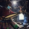[Photo] Độc đáo nghề dệt vải lanh của người H'Mông ở Vân Hồ 