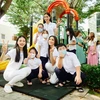 Cá thí sinh Hoa hậu Hoàn vũ Việt Nam giao lưu, gặp gỡ và trao quà cho các bé có hoàn cảnh đặc biệt tại Nhà bảo trợ trẻ em Long Hải. (Ảnh: CTV/Vietnam+)