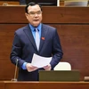 Chủ tịch Tổng Liên đoàn lao động Việt Nam, ông Nguyễn Đình Khang giải trình, làm rõ một số vấn đề trong phiên làm việc sáng nay. (Ảnh: TTXVN)