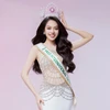 Thanh Thủy mang trên mình dải băng Miss International Vietnam 2024 cùng vương miện Hoa hậu Việt Nam sẵn sàng cho cuộc thi quốc tế. (Ảnh: CTV/Vietnam+)