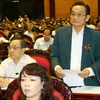 Ông Trần Du Lịch - đại biểu Quốc hội Thành phố Hồ Chí Minh phát biểu. (Ảnh: Trọng Đức/TTXVN)