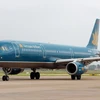 Máy bay của Vietnam Airlines chuẩn bị cất cánh. (Ảnh: Huy Hùng/TTXVN)