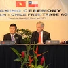 Chủ tịch nước Trương Tấn Sang và Tổng thống Chile Sebastián Piñera chứng kiến ký FTA giữa hai nước năm 2011. (Nguồn: Bộ Ngoại giao Chile)