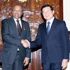 Chủ tịch nước Trương Tấn Sang tiếp ông Bakele Geleta, Tổng thư ký Hiệp hội Chữ thập Đỏ và Trăng lưỡi liềm Đỏ quốc tế. (Ảnh: Nguyễn Khang/TTXVN)