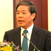 Bộ trưởng Nguyễn Minh Quang phát biểu tại hội thảo. (Ảnh: Hoàng Chương/Vietnam+)