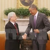Tổng thống Hoa Kỳ Barack Obama đón Tổng Bí thư Nguyễn Phú Trọng. (Ảnh: Trí Dũng/TTXVN)