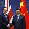 Chủ tịch Trung Quốc Tập Cận Bình và Thủ tướng Anh David Cameron. (Nguồn: Reuters)