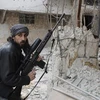 Một tay súng phe đối lập Syria. (Nguồn: AP)