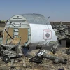 Mảnh vỡ máy bay Nga tại khu vực Wadi al-Zolomat trên bán đảo Sinai của Ai Cập. (Nguồn: AFP/TTXVN)
