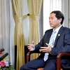 Thứ trưởng Bộ Ngoại giao Bùi Thanh Sơn trả lời phỏng vấn của báo chí về Hội nghị Cấp cao APEC lần thứ 23 sẽ được tổ chức tại Philippines. (Ảnh: An Đăng/TTXVN)