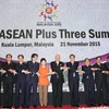 Các nhà lãnh đạo dự Hội nghị cấp cao ASEAN+3 lần thứ 18. (Nguồn: Yonhap/TTXVN)
