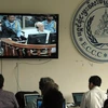 Các nhà báo theo dõi phiên tòa xét xử tội ác Khmer Đỏ qua màn hình tại trụ sở ECCC hồi năm 2014. (Nguồn: TTXVN)