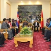 Bộ trưởng Trần Đại Quang; Thống tướng Em Sam An, Quốc vụ khanh Bộ Nội vụ Vương quốc Campuchia cùng các đại biểu tại buổi tiếp. (Nguồn: Bộ Công an)