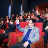 Các đại biểu biểu quyết thông qua kết quả bầu Ban Chấp hành Trung ương Đảng khóa XII. (Ảnh: TTXVN)