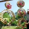 Các nghệ nhân làm các tiểu cảnh để sử dụng cho đường hoa Nguyễn Huệ. (Ảnh: Mạnh Linh/TTXVN)