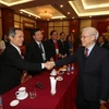 Tổng Bí thư Nguyễn Phú Trọng với các đại biểu. (Ảnh: Trí Dũng/TTXVN) 