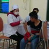 Tiêm vắcxin sởi-rubella. (Nguồn: TTXVN)