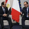Tổng thống Pháp Francois Hollande (phải) và Tổng thống Ai Cập Abdel Fattah El-Sisi trong một cuộc gặp. (Nguồn: Reuters)